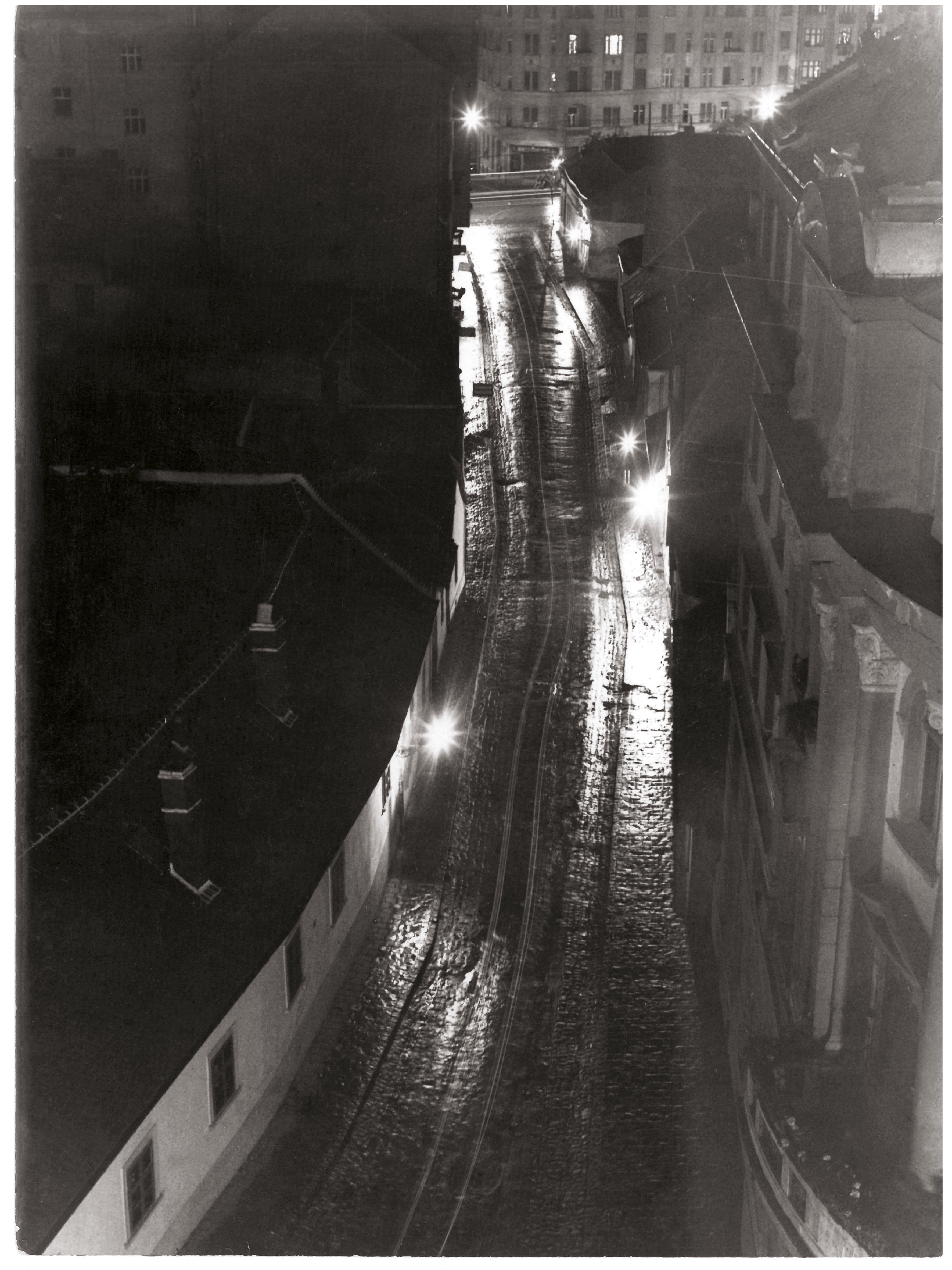 Iván Hevesy: A Buda Street at Night, in the Rain, 1934–1941, between 1934–1941, gelatin silver print, Mihály Medve Collection